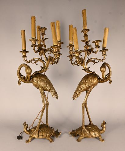 Pair of bronze candelabras with waders and...