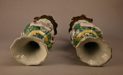 Pair of green family porcelain vases mounted...