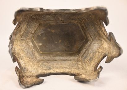 Pewter candlestick with openwork decoration...