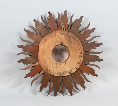 Gilded wood sunburst mirror with convex mirror
An...