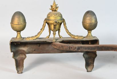 Pair of Louis XVI ormolu andirons decorated...
