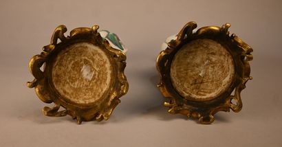 Pair of green family porcelain vases mounted...