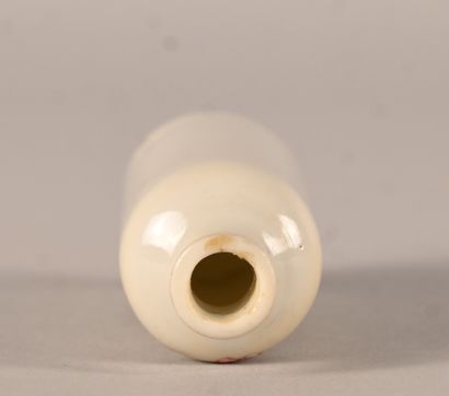 Porcelain snuff bottle with polychrome floral...