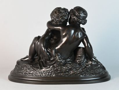 Group in patinated bronze of two embracing...