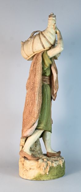 Royal Dux, polychrome porcelain water carrier
Standing...
