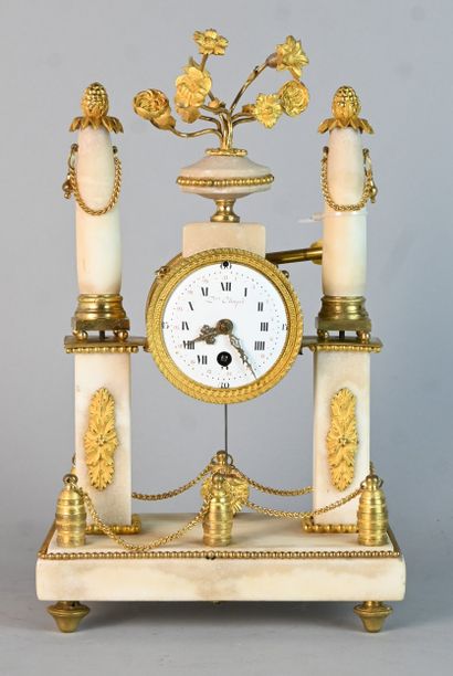 Gilt bronze clock in the Louis XVI style,...