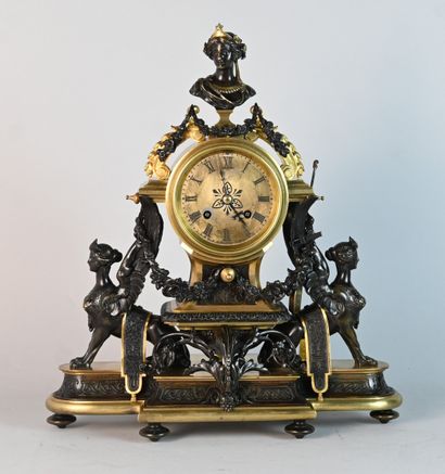 Patinated bronze and gilt bronze clock with...