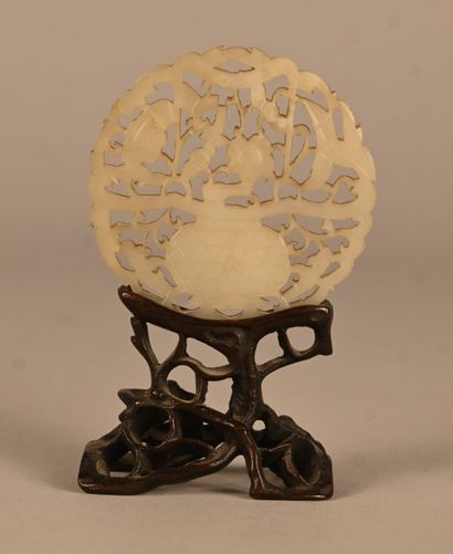 Openwork jade plaque on wooden base, China,...