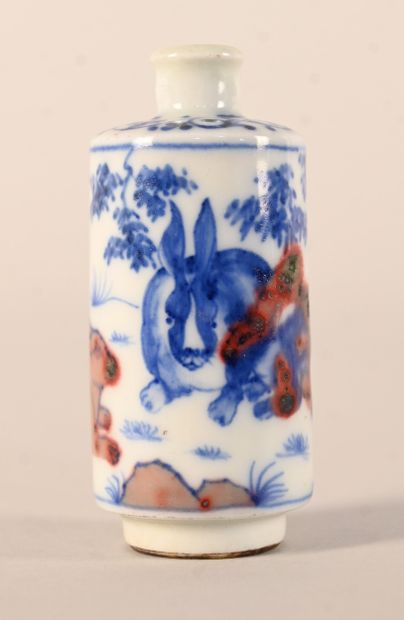 Blue and red porcelain snuff bottle decorated...