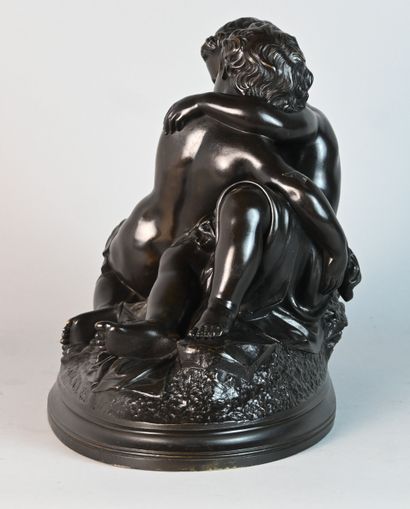 Group in patinated bronze of two embracing...