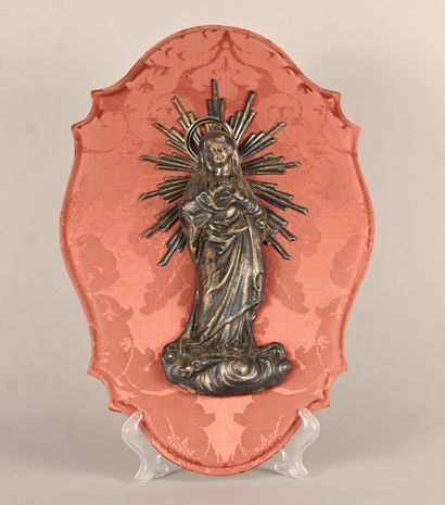 Relief of the Virgin Mary in silver on panel,...