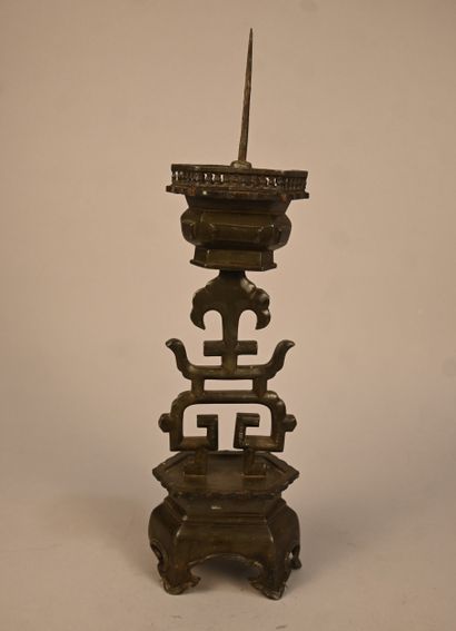 Pewter candlestick with openwork decoration...