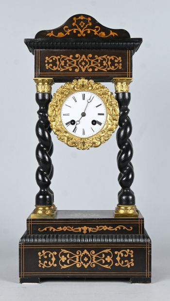 Blackened wood and gilt bronze column clock...