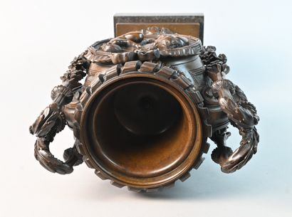 Bronze vase decorated with children and garlands,...