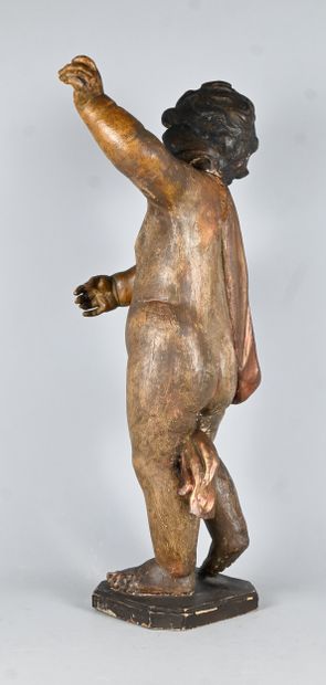 Baroque standing angel in carved and gilded...