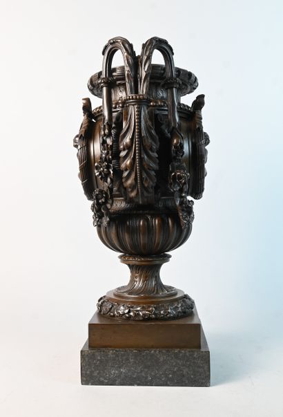 Bronze vase decorated with children and garlands,...