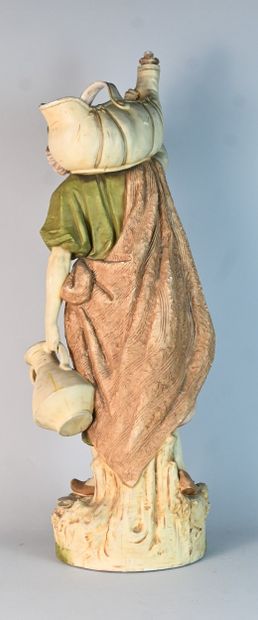 Royal Dux, polychrome porcelain water carrier
Standing...