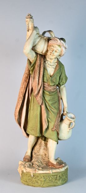Royal Dux, polychrome porcelain water carrier
Standing...