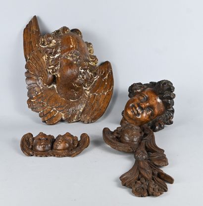 Set of four carved wood angel heads, 18th-19th...