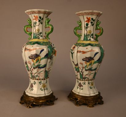 Pair of green family porcelain vases mounted...