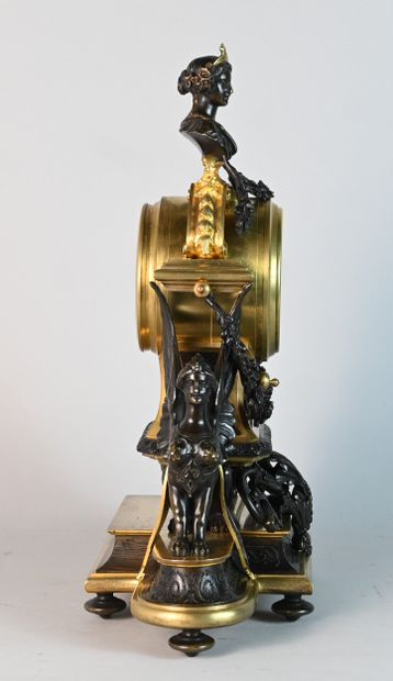 Patinated bronze and gilt bronze clock with...