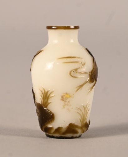 Peking glass snuff bottle with frog and vegetation...