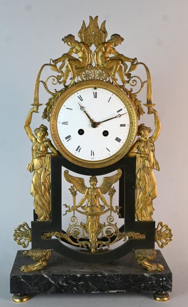 Empire ormolu clock with winged figures on...