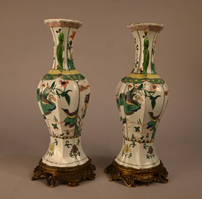 Pair of green family porcelain vases mounted...