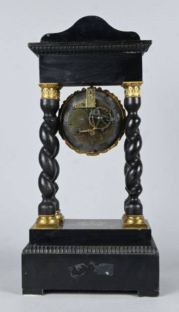 Blackened wood and gilt bronze column clock...