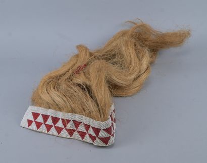 Tutsi hair ornament decorated with glass...