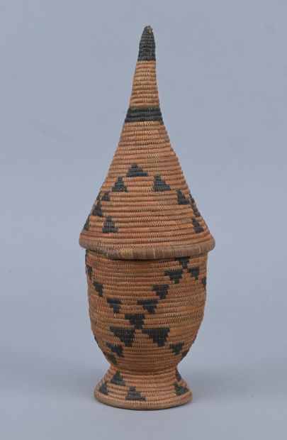 Tutsi agaseke on pedestal with geometric...