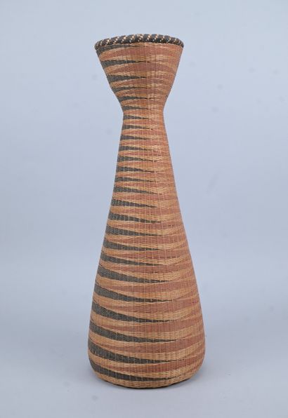 Slender Tutsi basket with geometric decoration...