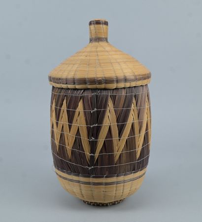 Covered Tutsi basket in geometric basketry...