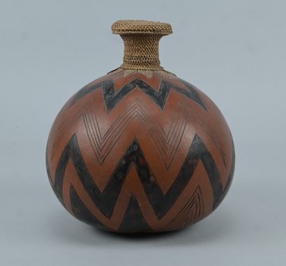 Tutsi gourd with incised geometric decoration...