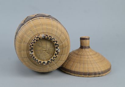 Covered Tutsi basket in geometric basketry...