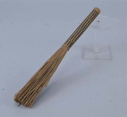 Ceremonial beer skimmer in braided raffia...