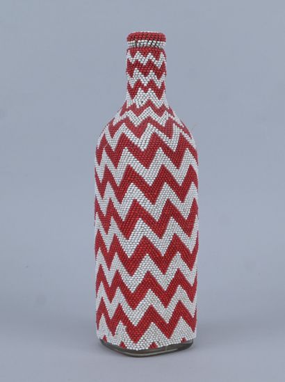 Glass bead-covered bottle with zigzag pattern...