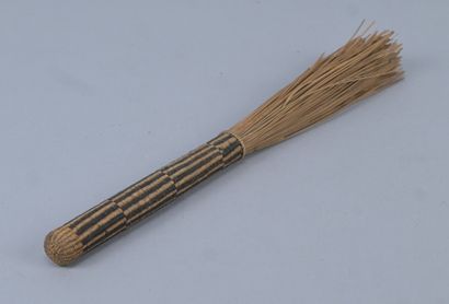 Ceremonial beer skimmer in braided raffia...