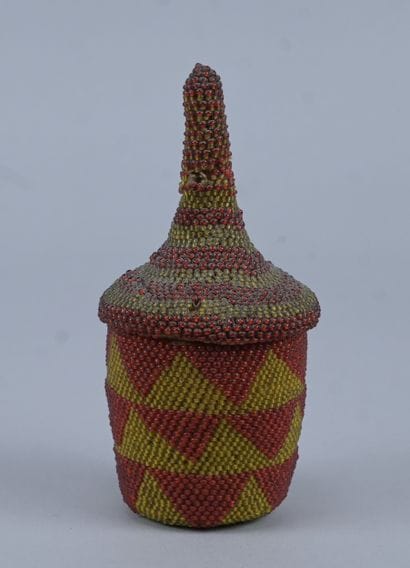 Tutsi covered basket in beaded raffia with...