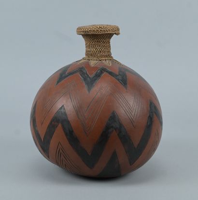 Tutsi gourd with incised geometric decoration...