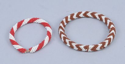 Pair of Tutsi bracelets in raffia and glass...