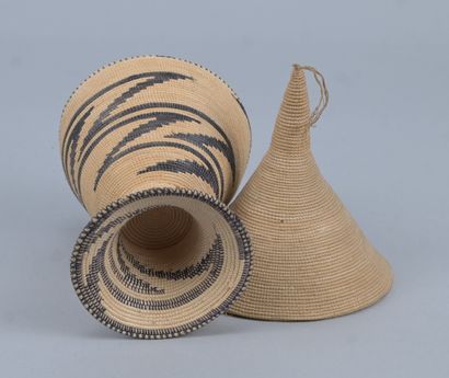 Tutsi agaseke on pedestal in woven plant...