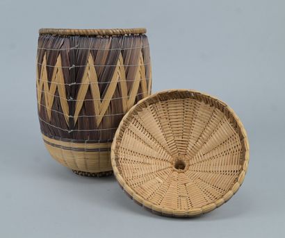 Covered Tutsi basket in geometric basketry...