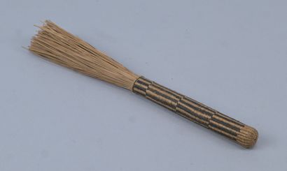 Ceremonial beer skimmer in braided raffia...