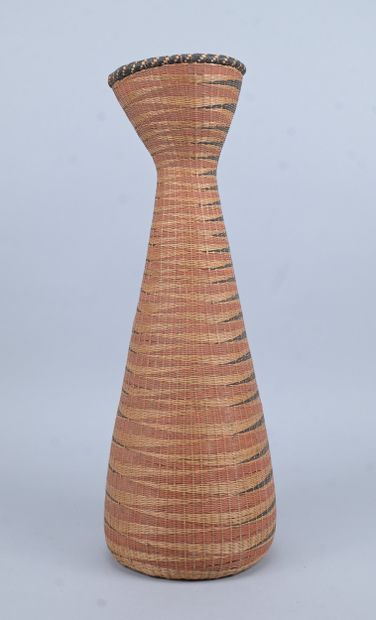 Slender Tutsi basket with geometric decoration...
