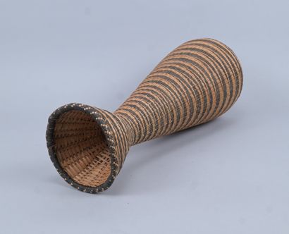 Slender Tutsi basket with geometric decoration...
