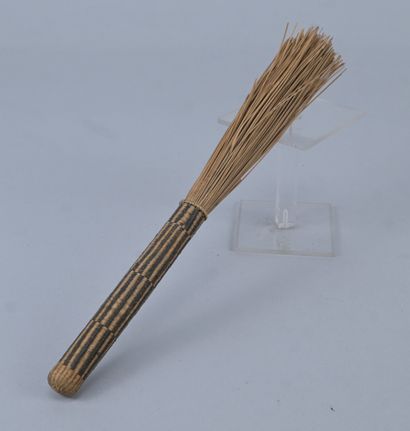 Ceremonial beer skimmer in braided raffia...