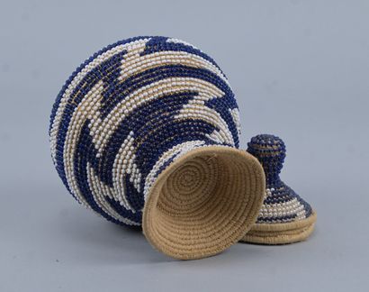 Covered Tutsi basket in raffia basketry and...