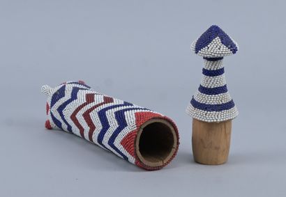 Tutsi wooden straw holder covered with glass...