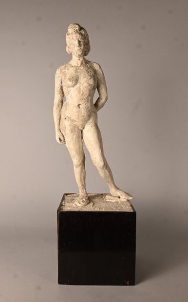 Modernist sculpture of a female nude on a...